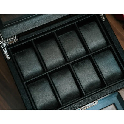 Coffret remontoir noir en cuir végétal avec huit emplacements de rangement pour montres automatiques.